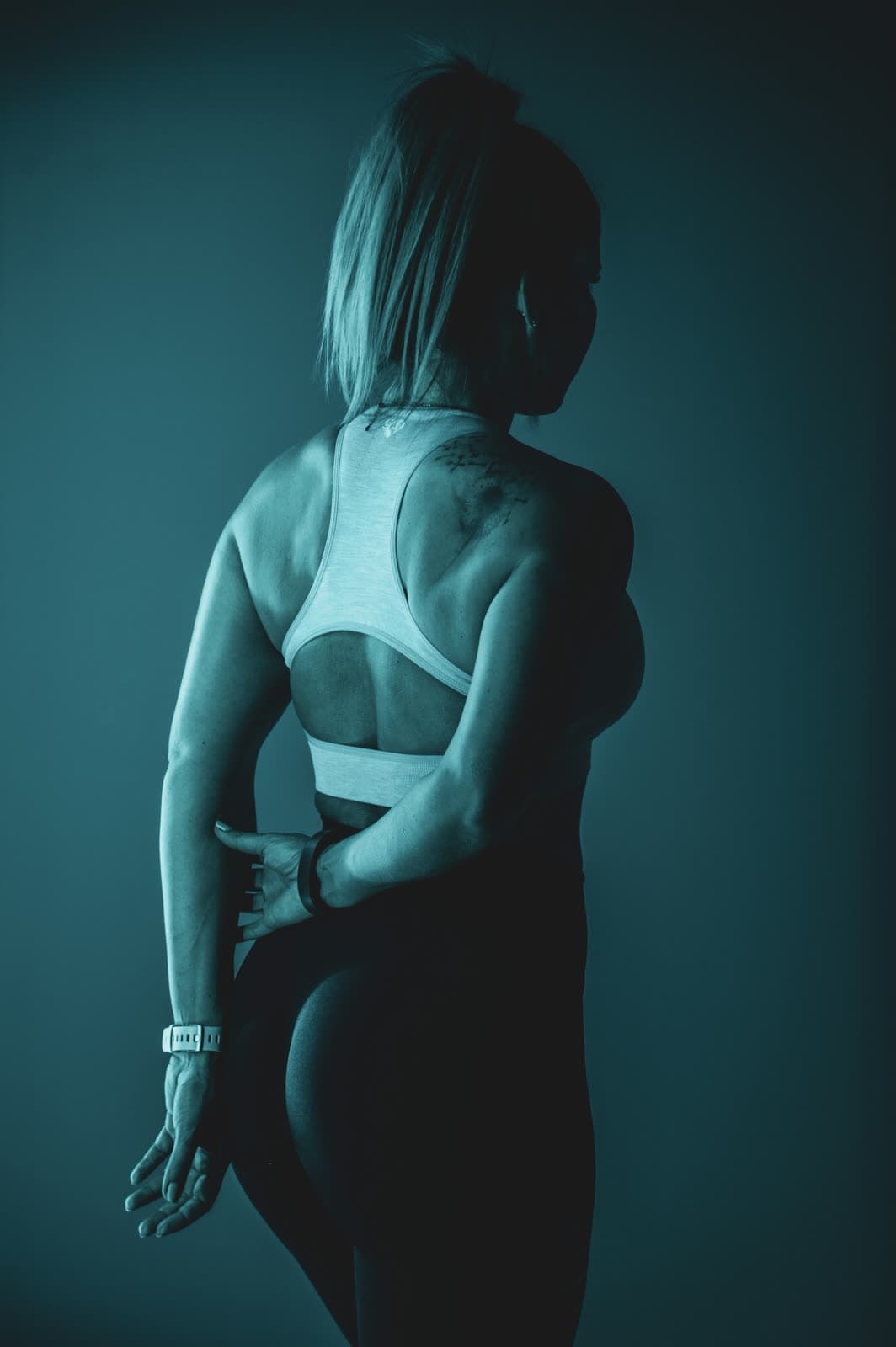 An athletic woman with a strong, toned back