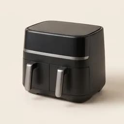 A dual-drawer air fryer with golden chips