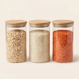 Glass storage jars of oats, rice and lentils